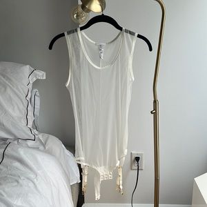 La Perla sheer bodysuit. Never WORN. Size 2. Garter connects at the bottom.